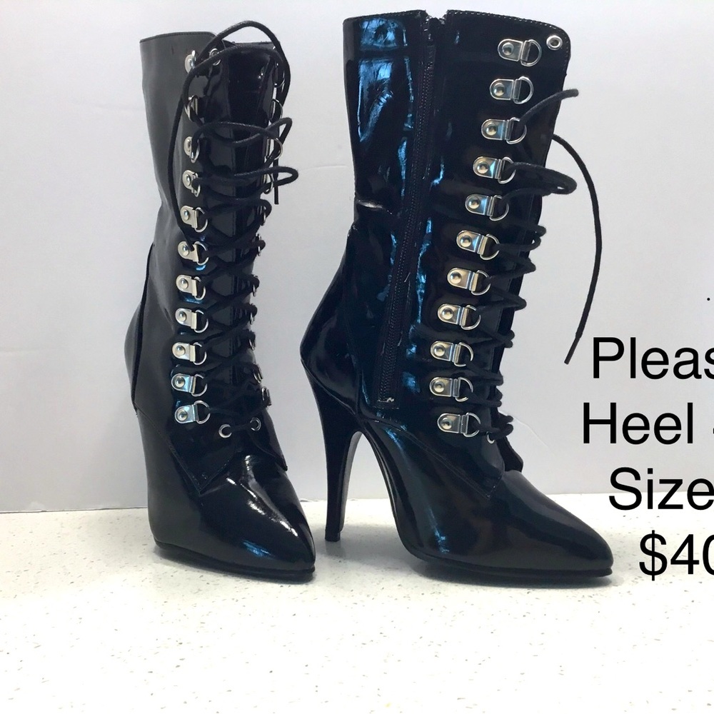 Mid calf boots. Item is new in unworn condition.